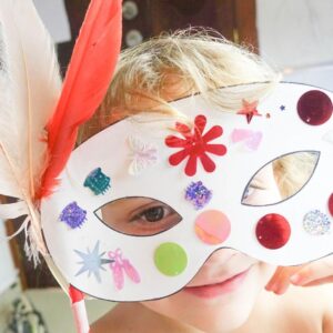 Around the World paper mask template decorated with gems and stickers