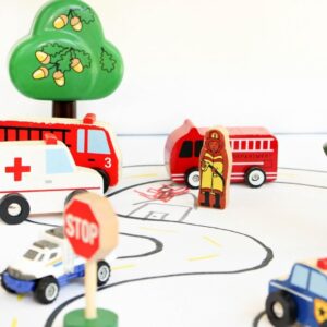 Community helpers for preschool activity. Create a small world for the emergency vehicles.