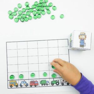 Roll a dice and graph the images math activity included in preschool community helpers lesson plans.