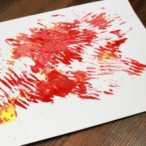 Chicken scratch painting with red paint preschool art activity