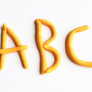 Make letters with play dough for a five senses literacy activity.