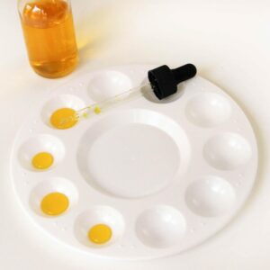 Honey transfer activity with paint pallet and pipettes.