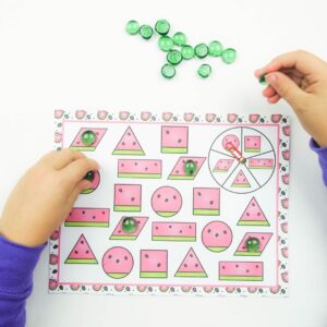 Watermelon shape spin and cover summer preschool math game.