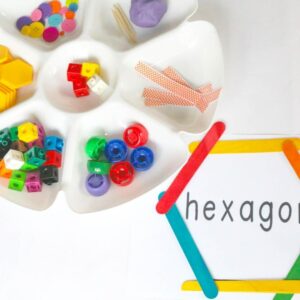 Build a hexagon using supplies like popsicle sticks and beads.