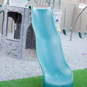 Slide and playground for outdoor summer preschool games.
