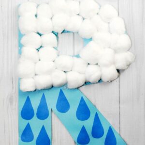 R is for rain weather crafts for preschoolers. Decorate an R with cotton balls and construction paper raindrops.